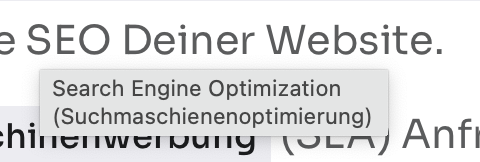 Tooltip zeigt die Erklärung von 'SEO' als 'Search Engine Optimization (Suchmaschinenoptimierung)' auf einer Webseite.